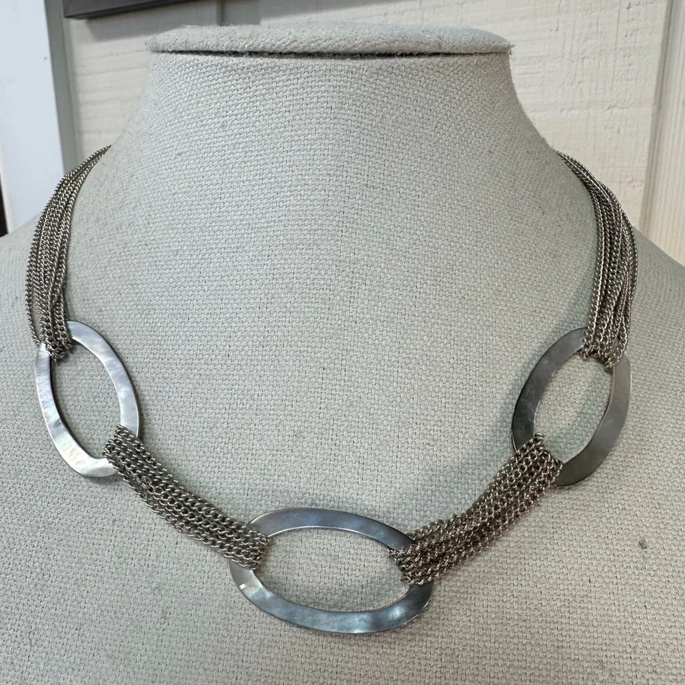 Oval abalone shell and multi silvertone chain necklace